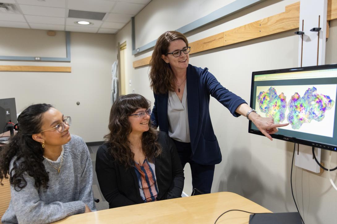 Maya Henry talking with students
